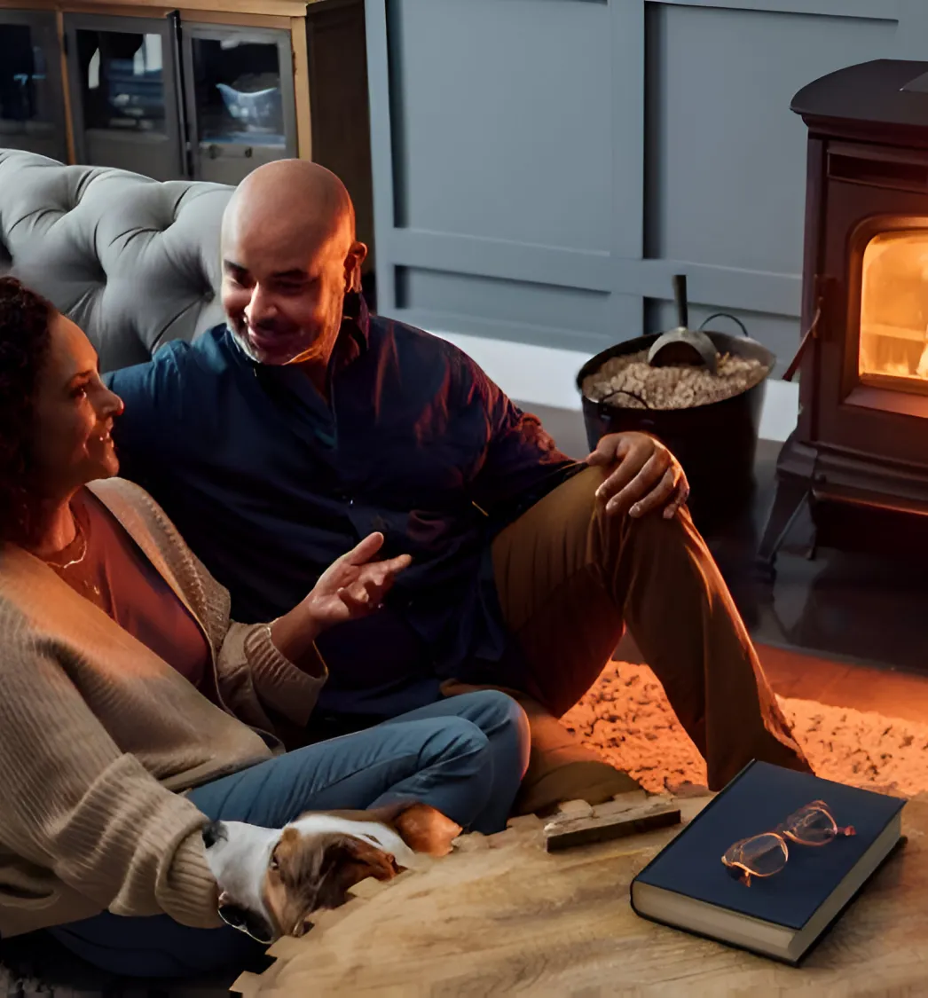 Couple Talking in front of burning fireplace
